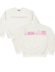 Local Merch Off-White Crewneck with Pink Text “Tuscaloosa” on the front, and Pink sketches of Denny Chimes, Bryant-Denny Stadium, the Tuska Stature, and President’s Mansion on the back