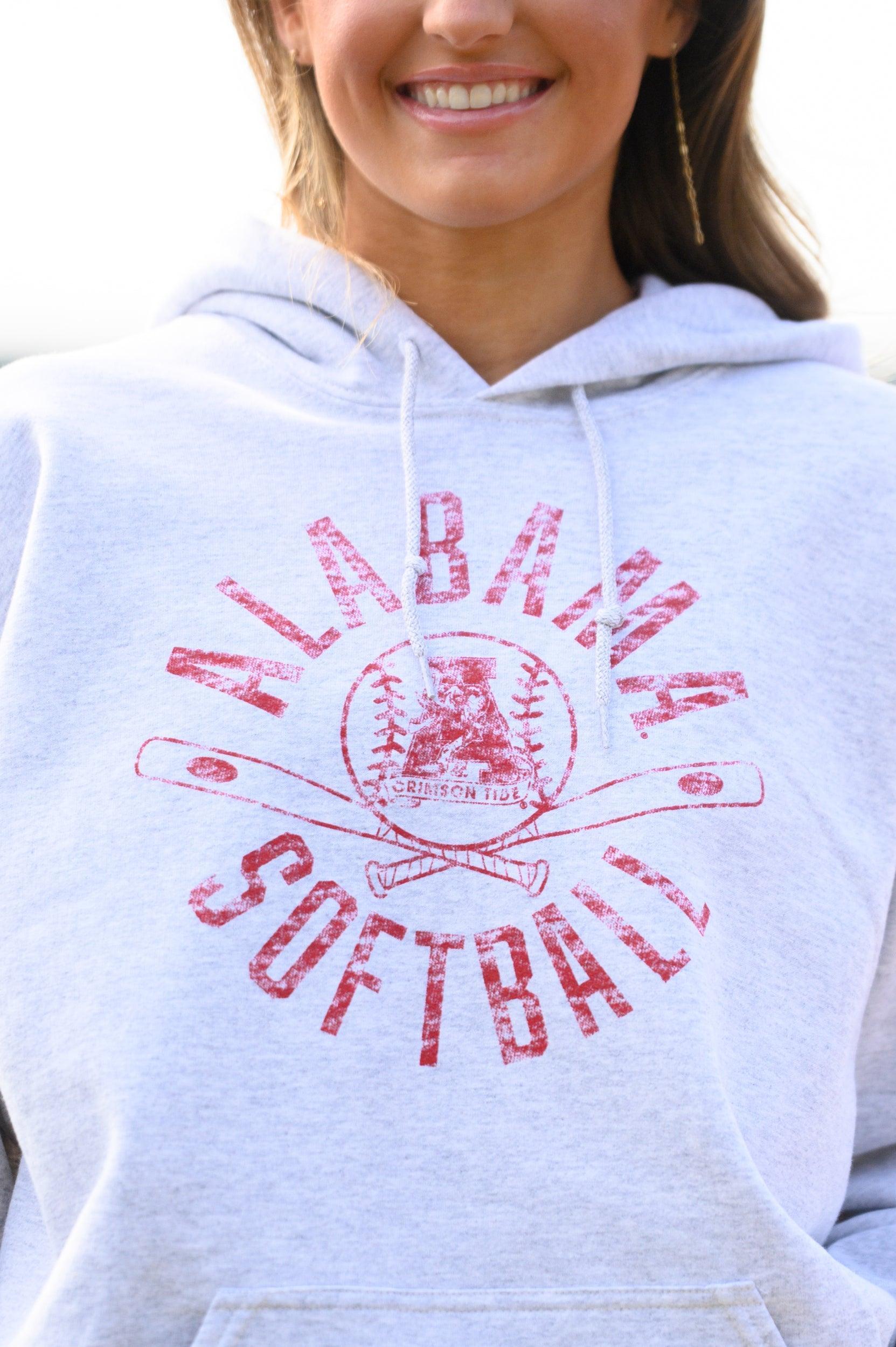 University of Alabama Distressed Light Grey Hoodie with a Red Softball featuring the Vintage A logo over crossed softball bats, surrounded by Red text “Alabama Softball”