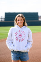 University of Alabama Distressed Light Grey Hoodie with a Red Softball featuring the Vintage A logo over crossed softball bats, surrounded by Red text “Alabama Softball”
