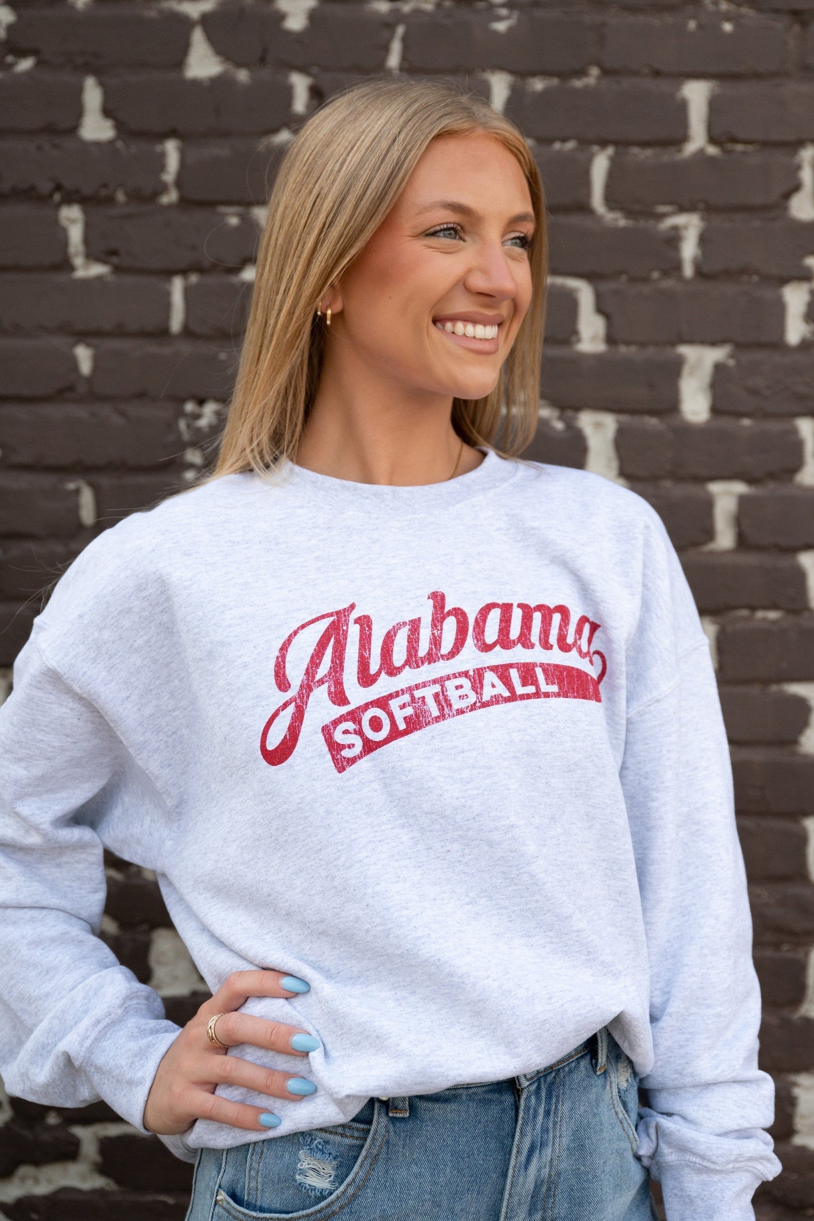 University of Alabama Alabama Softball Gildan Grey Crewneck with the Red script "Alabama" and White text "SOFTBALL" inside the script tail
