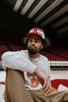 University of Alabama Red and White Trucker Hat with White piping, White stripes, and a fuzzy Crimson Block A patch