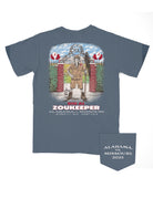 University of Alabama Blue T-Shirt with an illustration of Big Al standing outside of a football field in a zookeeper's outfit above the words “Big AL Zoukeeper”