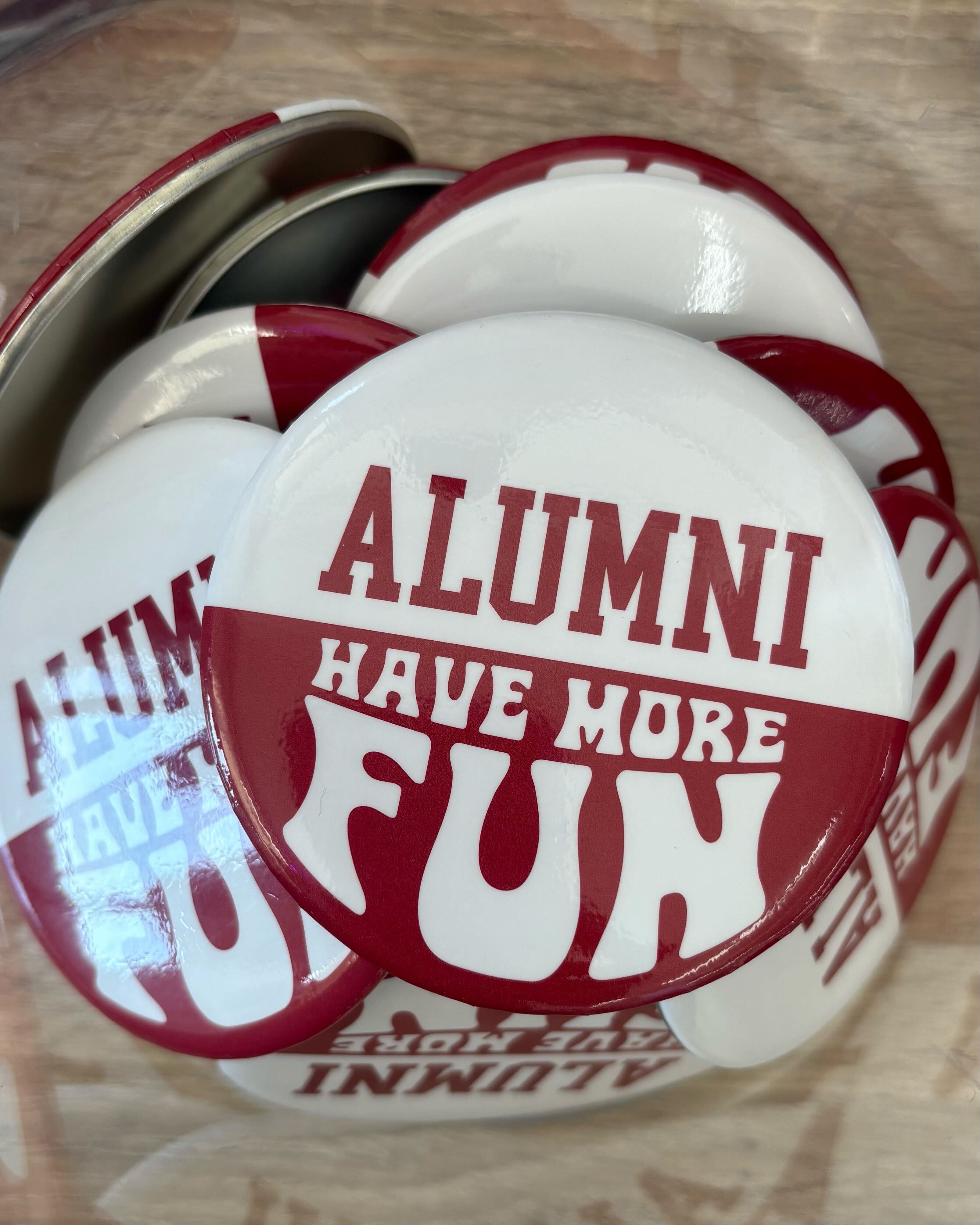 University of Alabama Red and White Button with text “Alumni Have More Fun”
