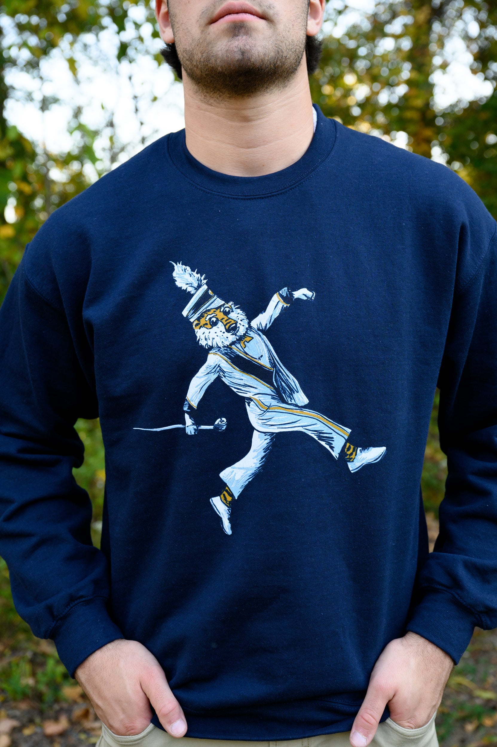 Auburn University Aubie Drum Major  Navy Hanes Sweatshirt with an image of Aubie the Tiger wearing a Drum Major's outfit and marching with the baton