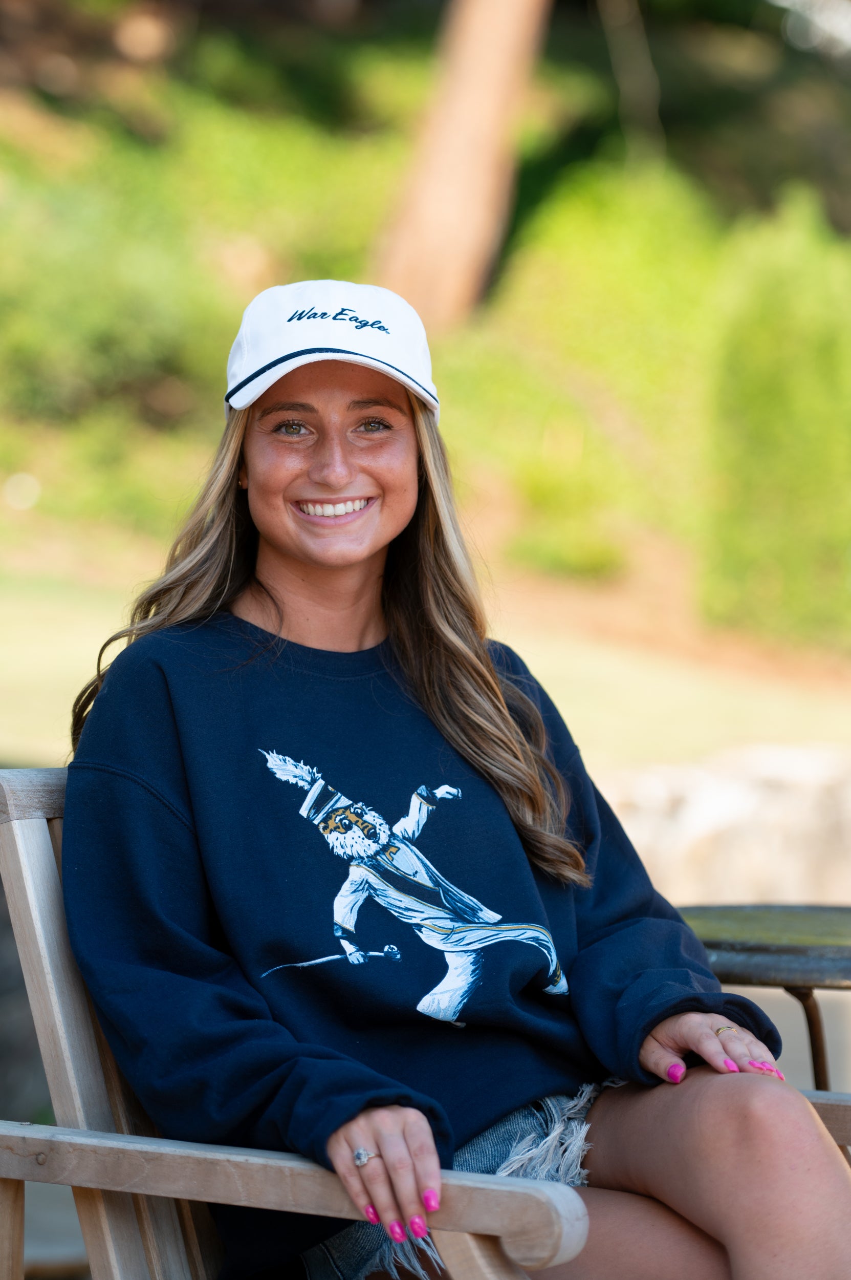 Auburn University Aubie Drum Major  Navy Hanes Sweatshirt with an image of Aubie the Tiger wearing a Drum Major's outfit and marching with the baton