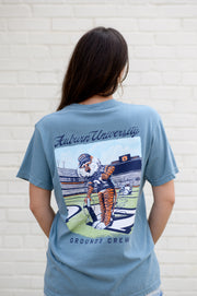 Auburn University Aubie Grounds Crew Ice Blue Comfort Colors T-Shirt with an image of Aubie the Tiger wearing a hat and painting the turf on the football field