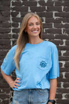 Auburn University Blue Shirt with a Front Pocket featuring a ship’s wheel circling the classic AU Logo