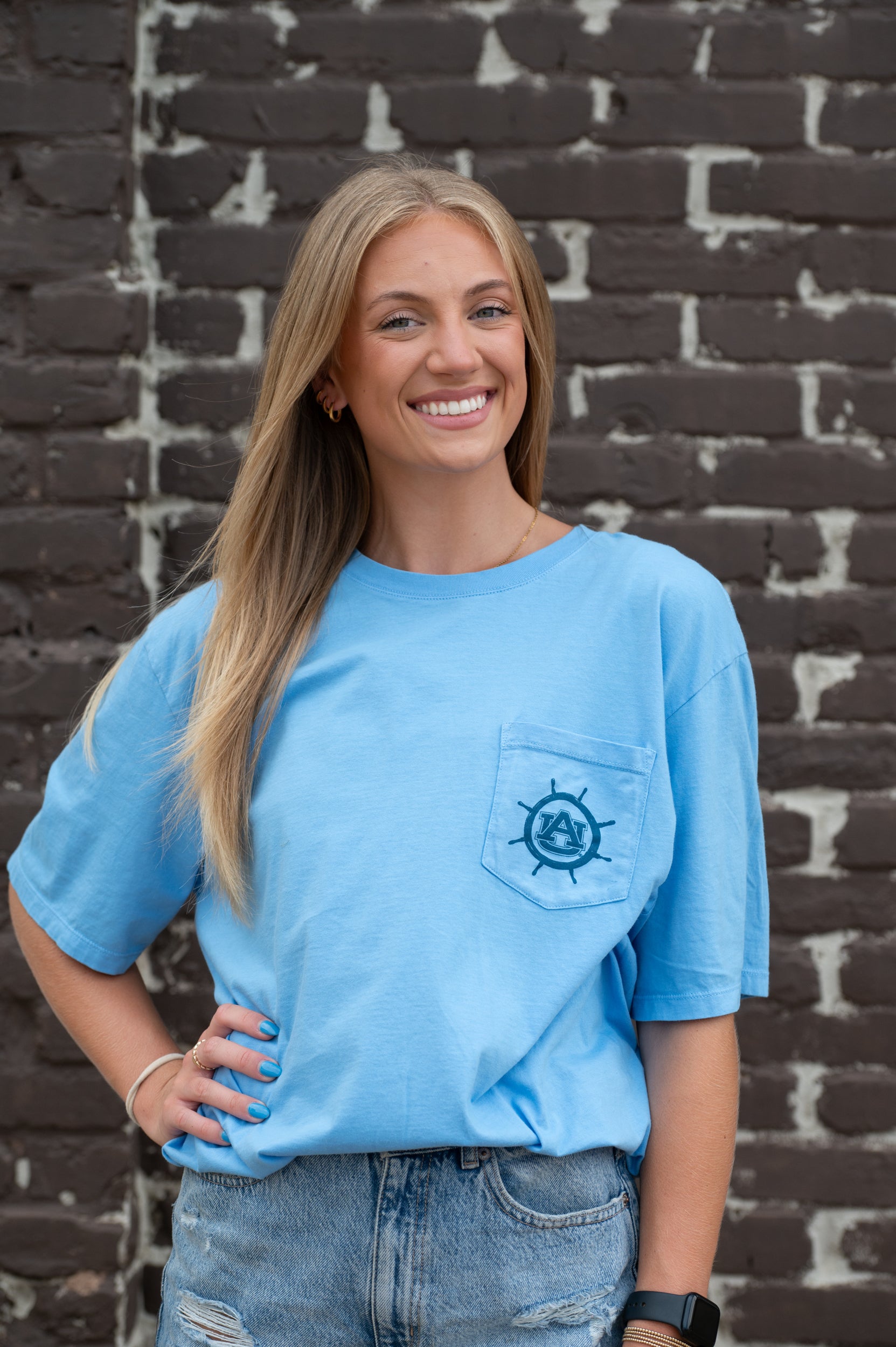 Auburn University Blue Shirt with a Front Pocket featuring a ship’s wheel circling the classic AU Logo
