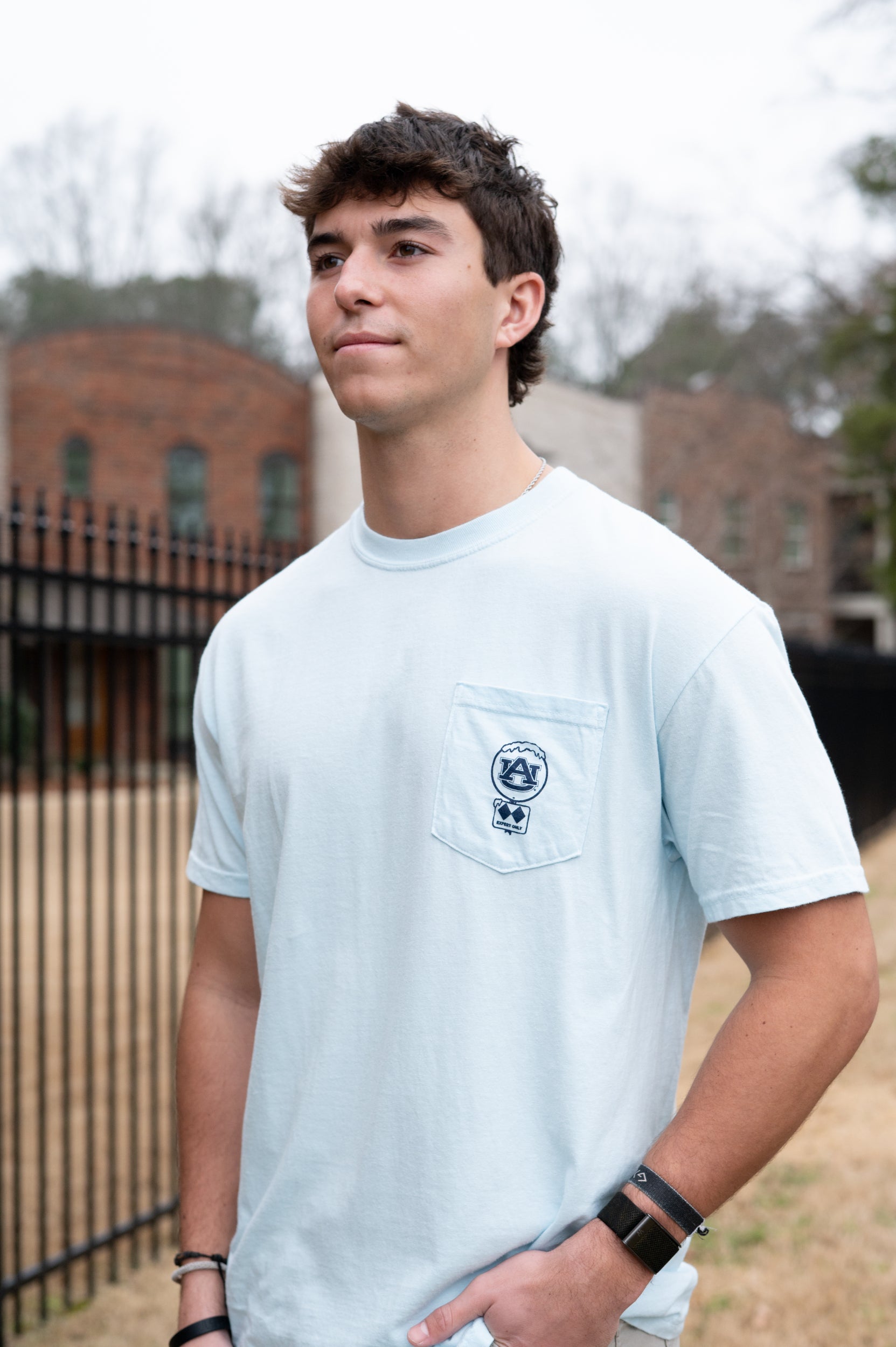 Auburn University Light Blue T-Shirt with a snow-covered Classic AU Logo on the front pocket 