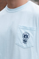 Auburn University Light Blue T-Shirt with a snow-covered Classic AU Logo on the front pocket 