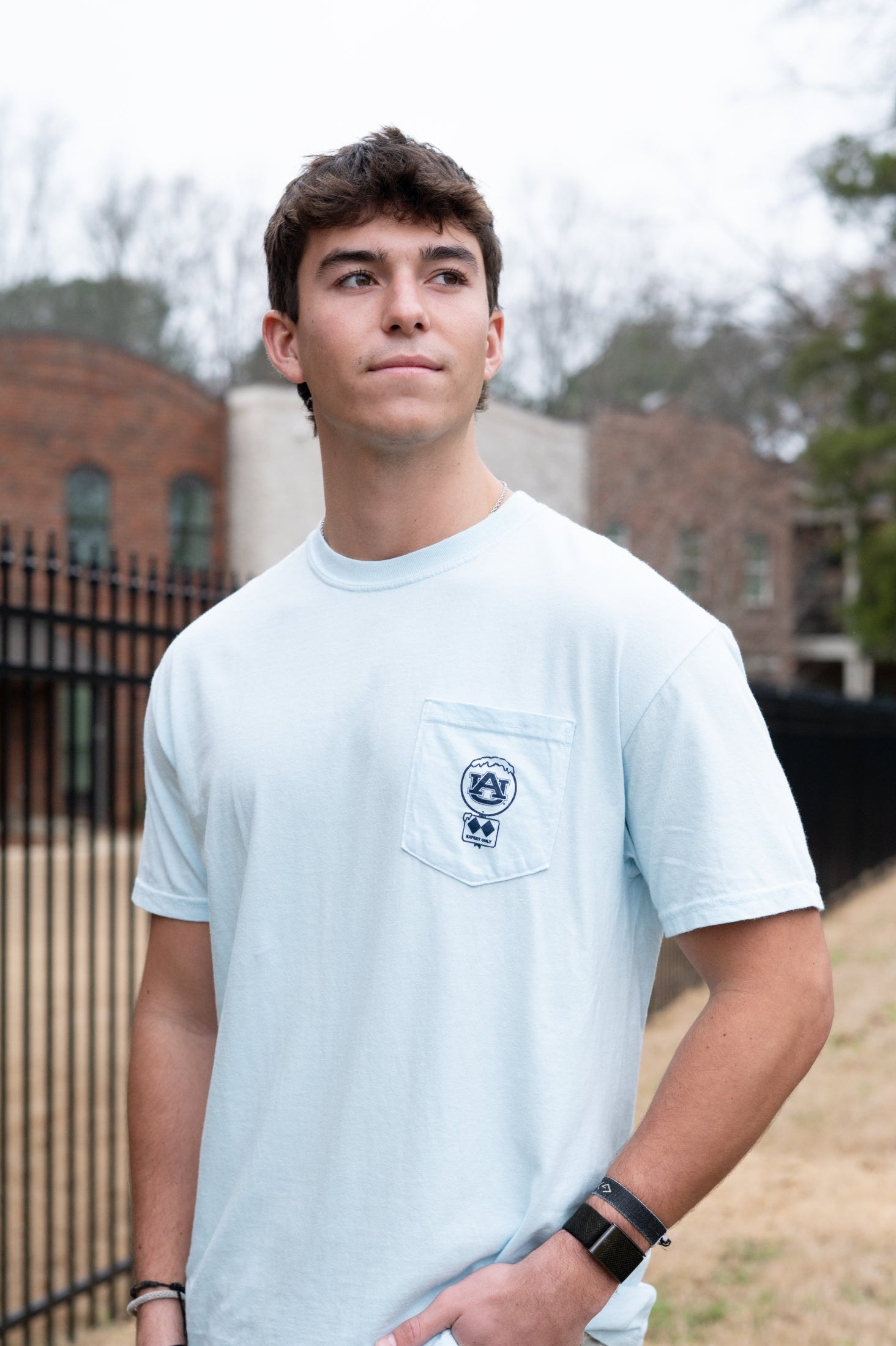 Auburn University Light Blue T-Shirt with a snow-covered Classic AU Logo on the front pocket 
