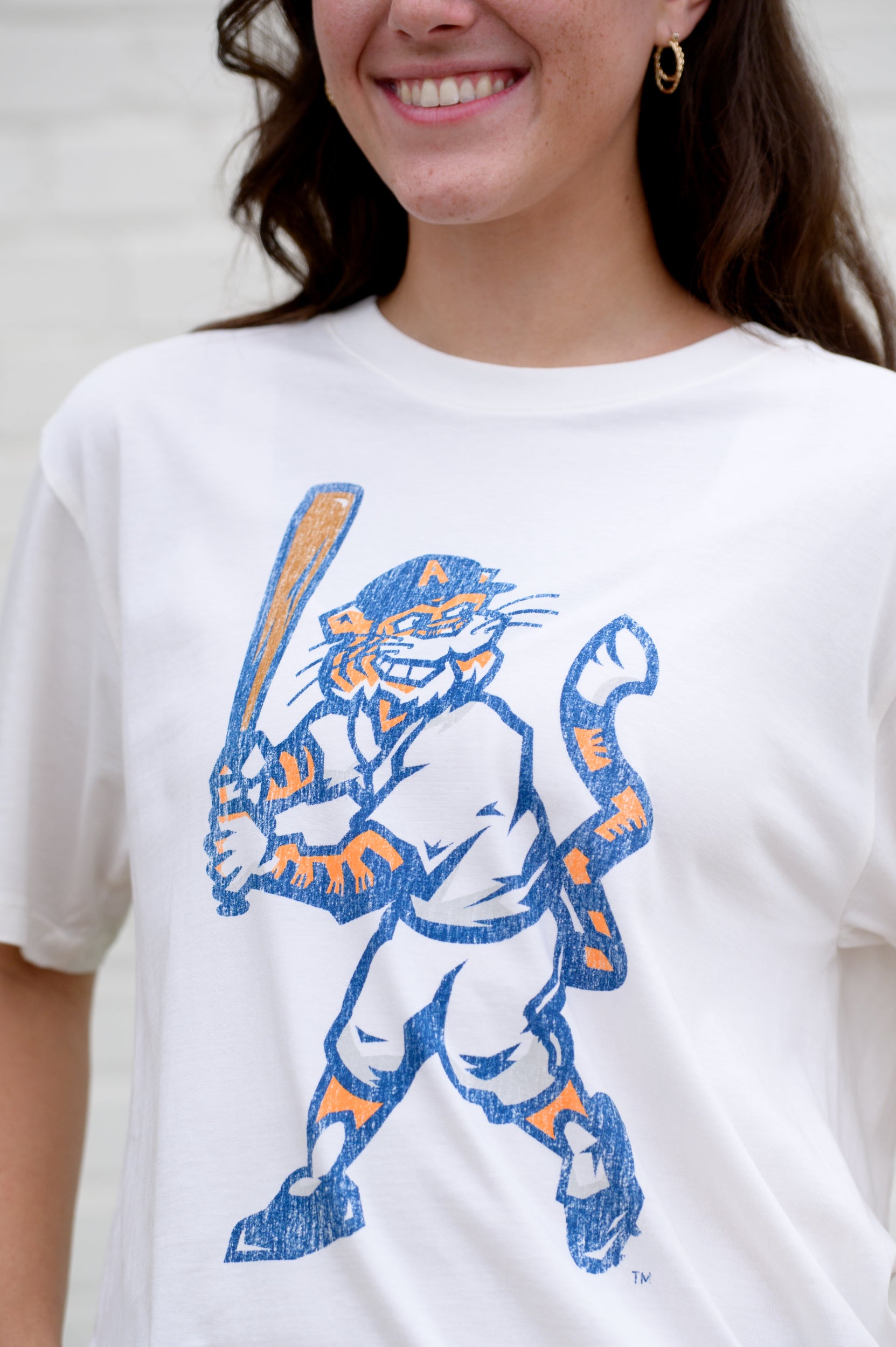 Auburn University Aubie Vintage Baseball Ivory  SoftShirts T-Shirt with an image of a vintage Aubie in a baseball uniform holding a baseball bat  