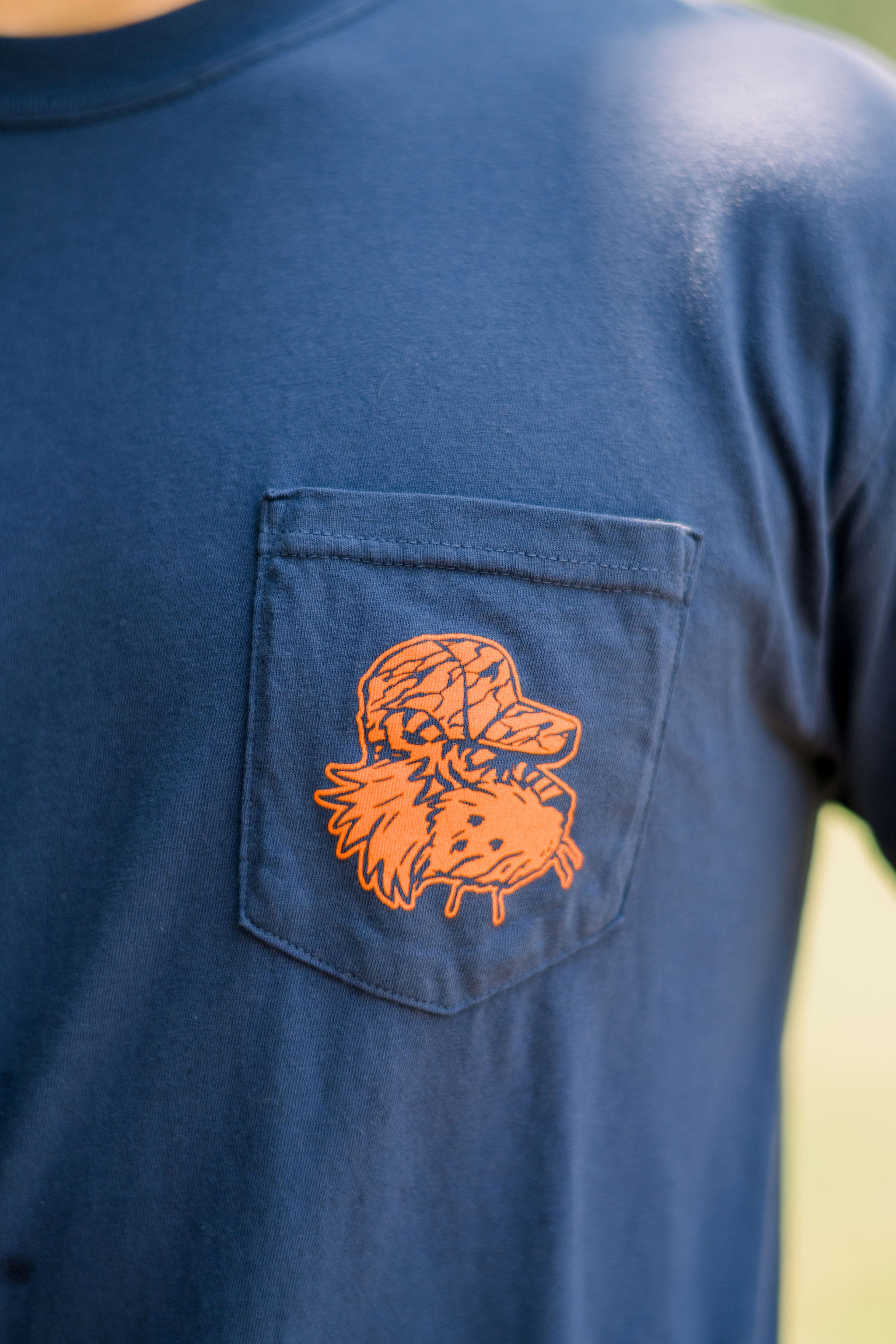 Aubie Deer Hunt Front Pocket with an image of Aubie wearing a Camo Hat