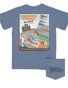 Auburn University Auburn 2024 Football Schedule Blue Comfort Colors T-Shirt With an image of a football stadium below a string of flags reading the 2024 football schedule  