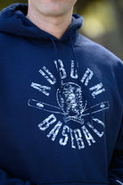 Auburn University Distressed Navy Hoodie with a White Baseball featuring the Original Aubie Baseball logo over crossed baseball bats, surrounded by White text “Auburn Baseball”