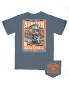 Auburn University Dark Blue T-Shirt with a basketball card style design featuring Aubie dribbling a basketball down the court in between text “Fear the Jungle Auburn” and “Basketball Neville Arena” and with an autograph from “Sir Aubie”