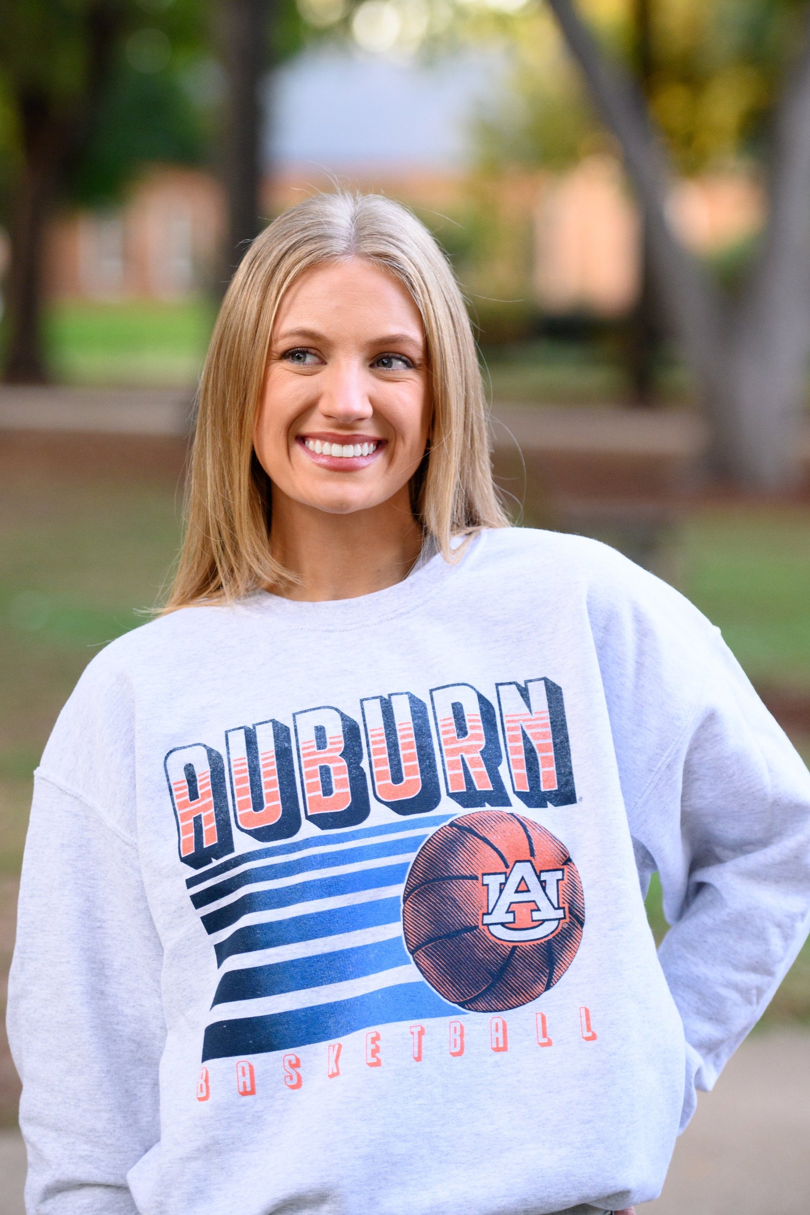 Auburn University Auburn Basketball Vintage Grey Gildan Sweatshirt with retro style Orange text "Auburn" and an image of a basketball with the AU Logo 