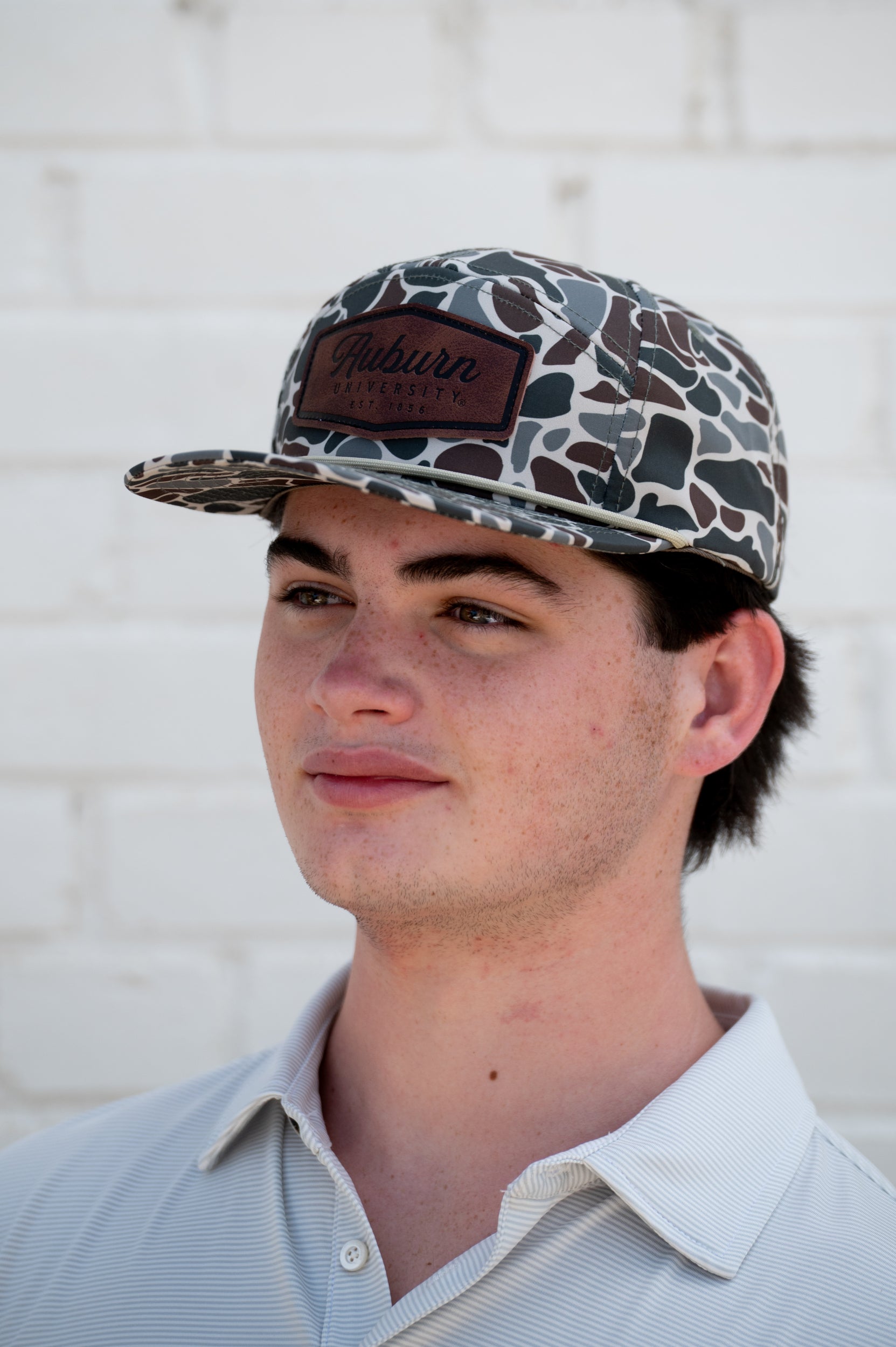 Auburn University Camo Hat with White rope and Leather patch with text "Auburn University"