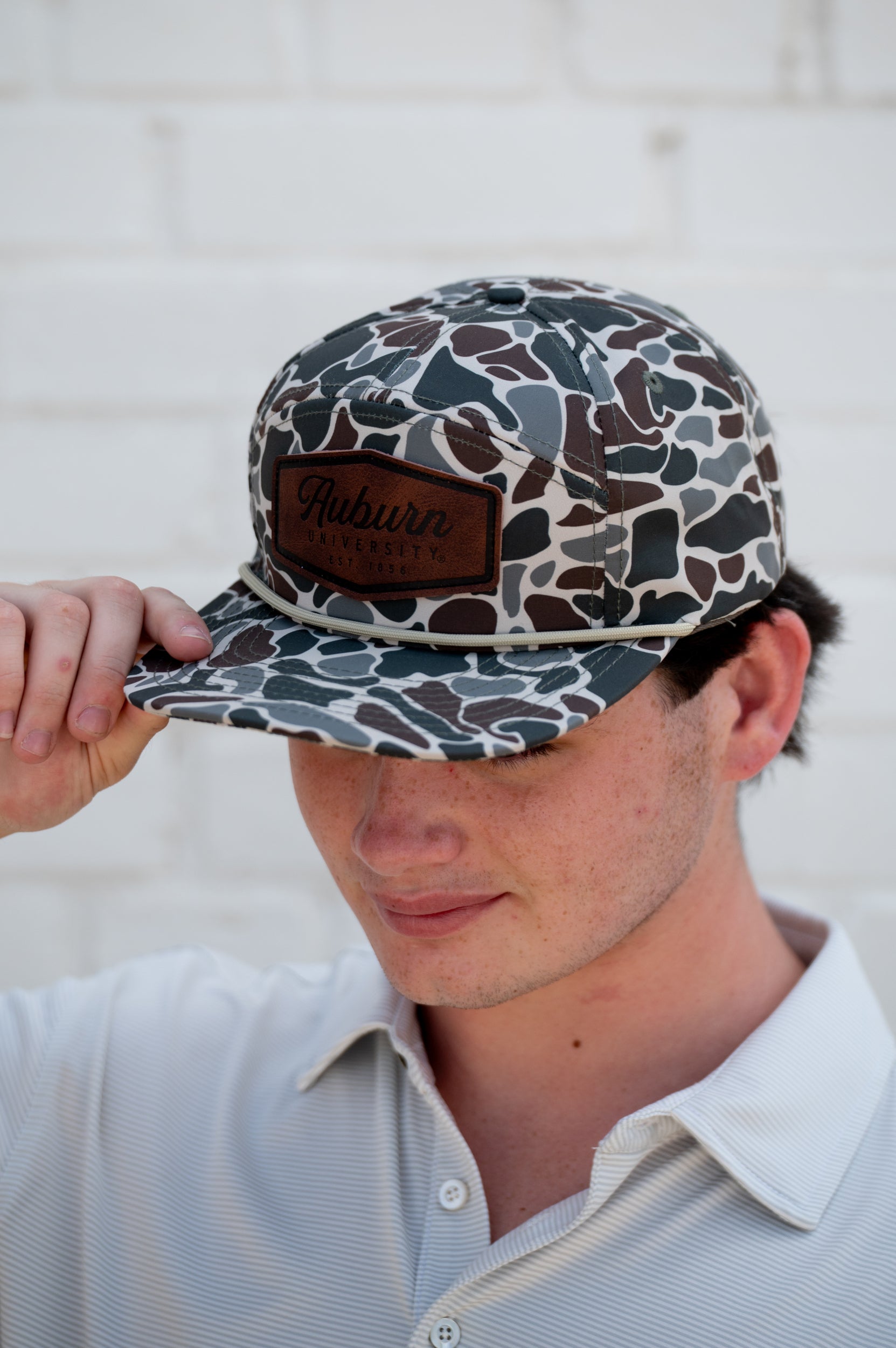 Auburn University Camo Hat with White rope and Leather patch with text "Auburn University"