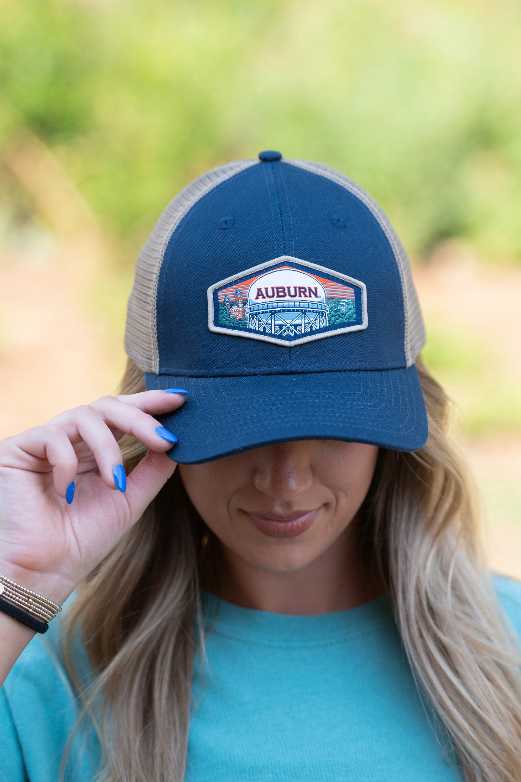Auburn University Navy Trucker Hat with a woven patch depicting the Auburn University campus.
