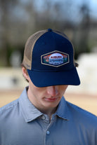 Auburn University Navy Trucker Hat with a woven patch depicting the Auburn University campus.