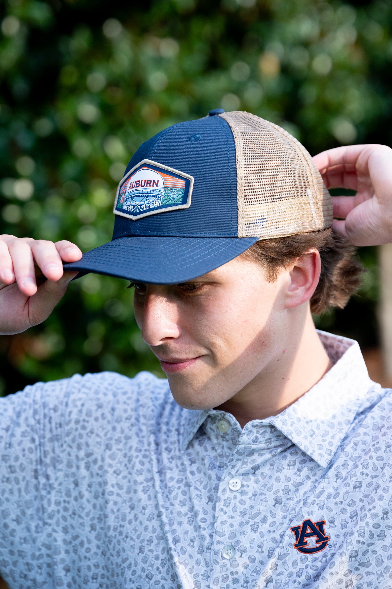 Auburn University Navy Trucker Hat with a woven patch depicting the Auburn University campus.