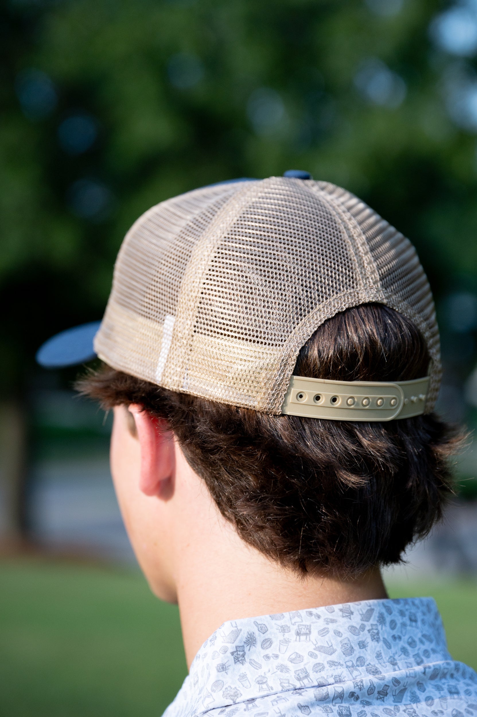 Auburn University Navy Trucker Hat with a woven patch depicting the Auburn University campus.