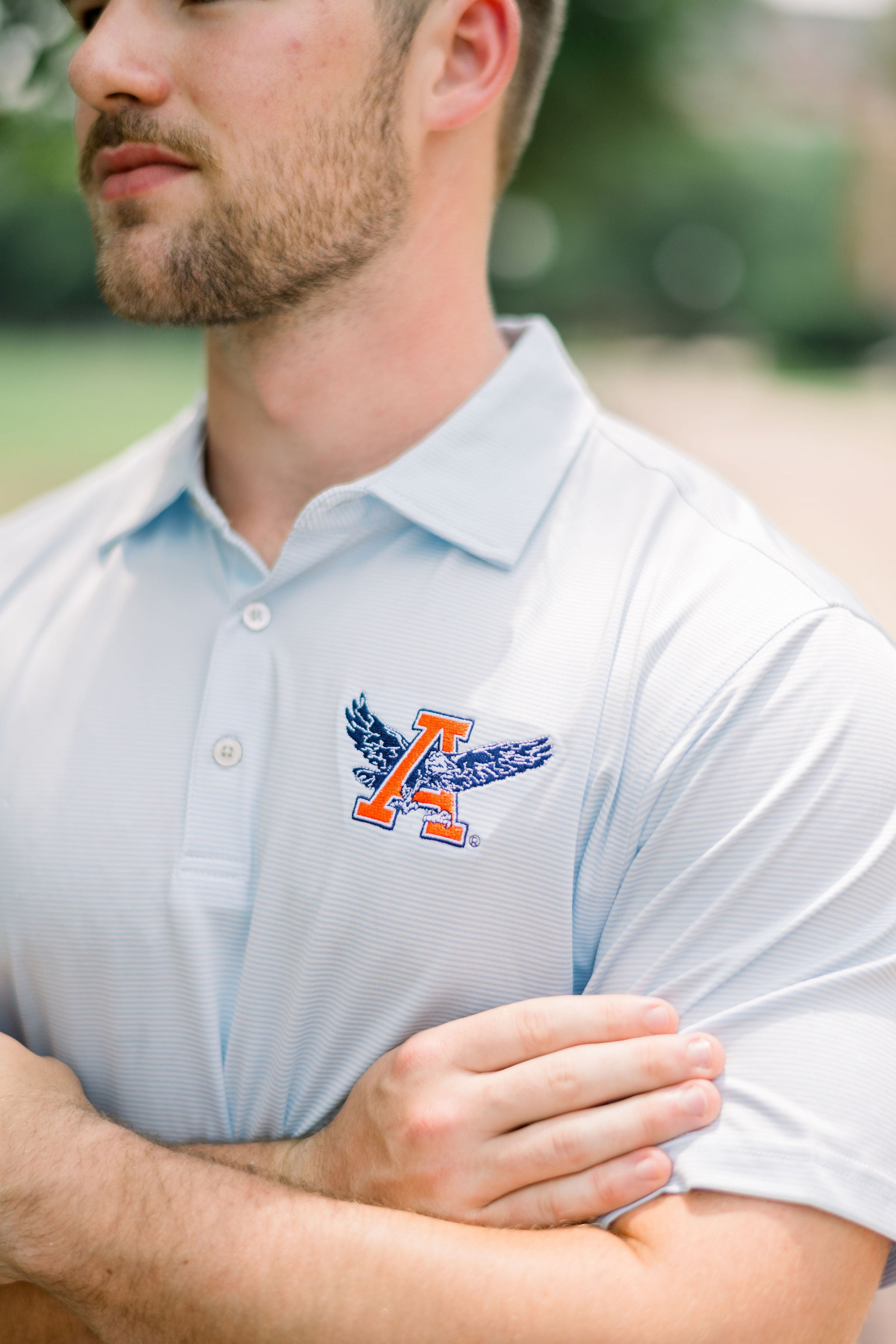 Auburn University Men’s Light Blue Stripe Polo with Auburn Eagle Logo embroidery