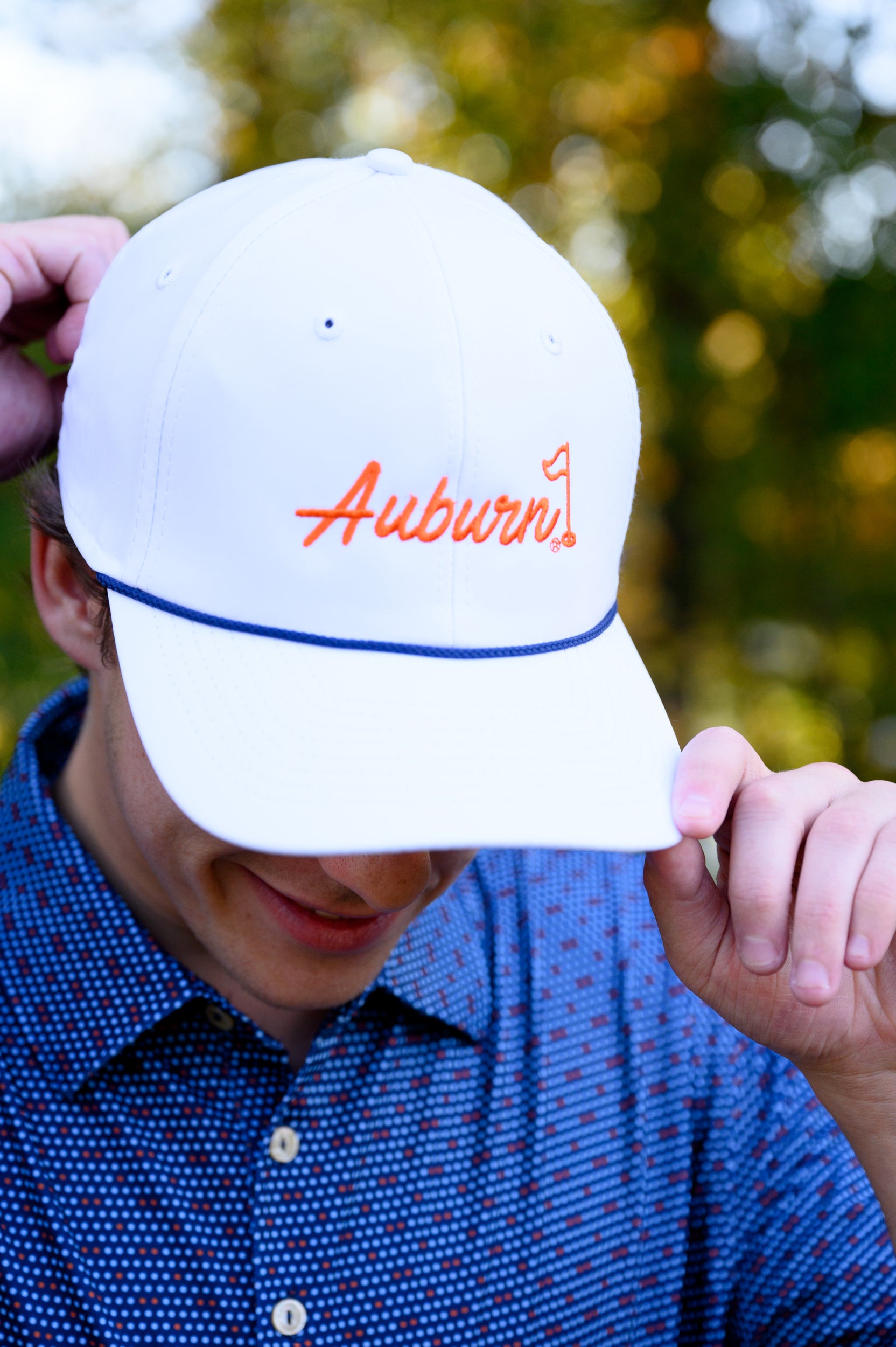Auburn University White Rope Hat with a Blue rope and Orange "Auburn" embroidery with a golf flag at the end