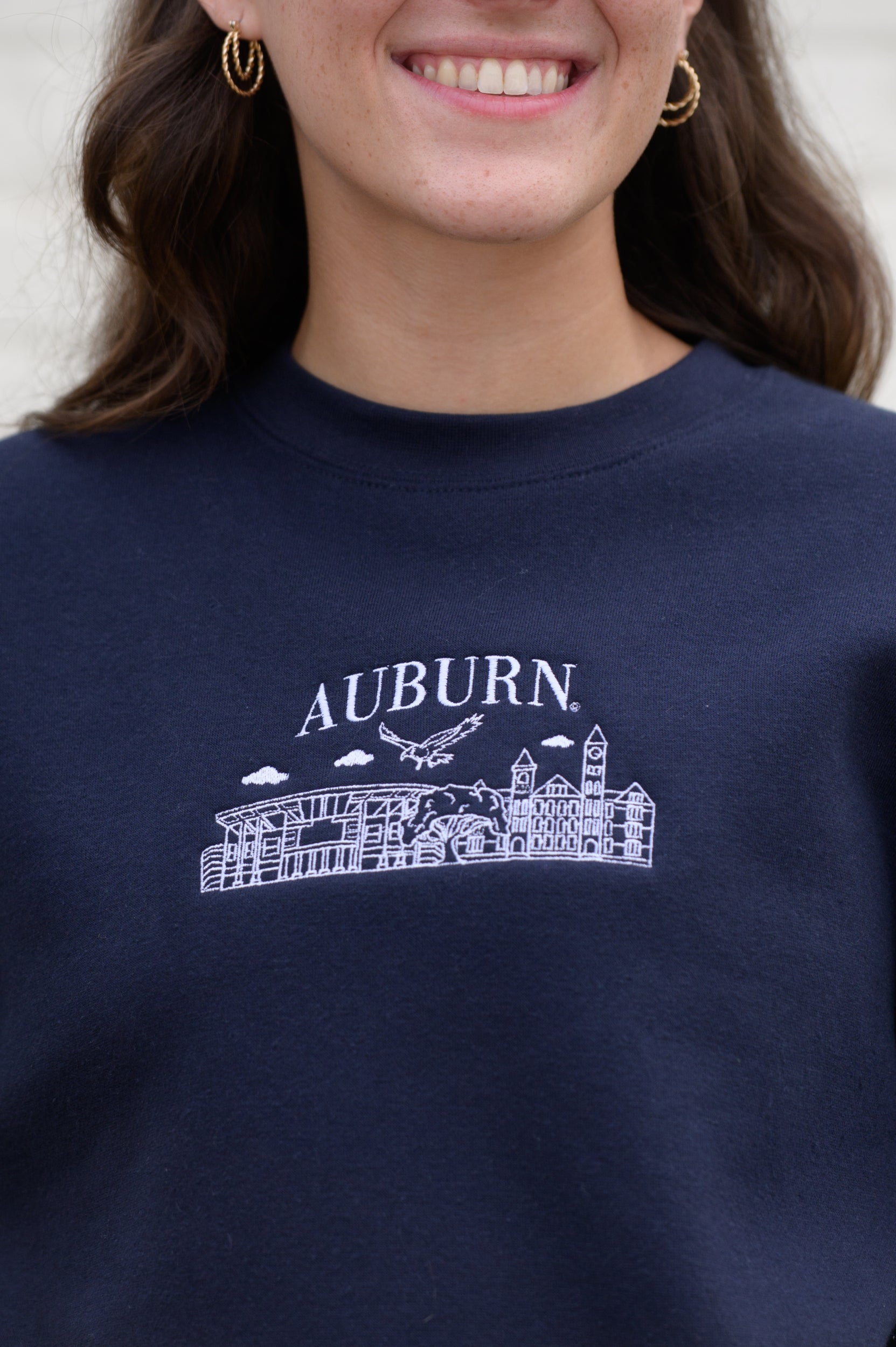 Auburn University Auburn Landmarks Navy Lane Seven Ladies' Sweatshirt with White embroidery of Auburn landmarks under text "Auburn"