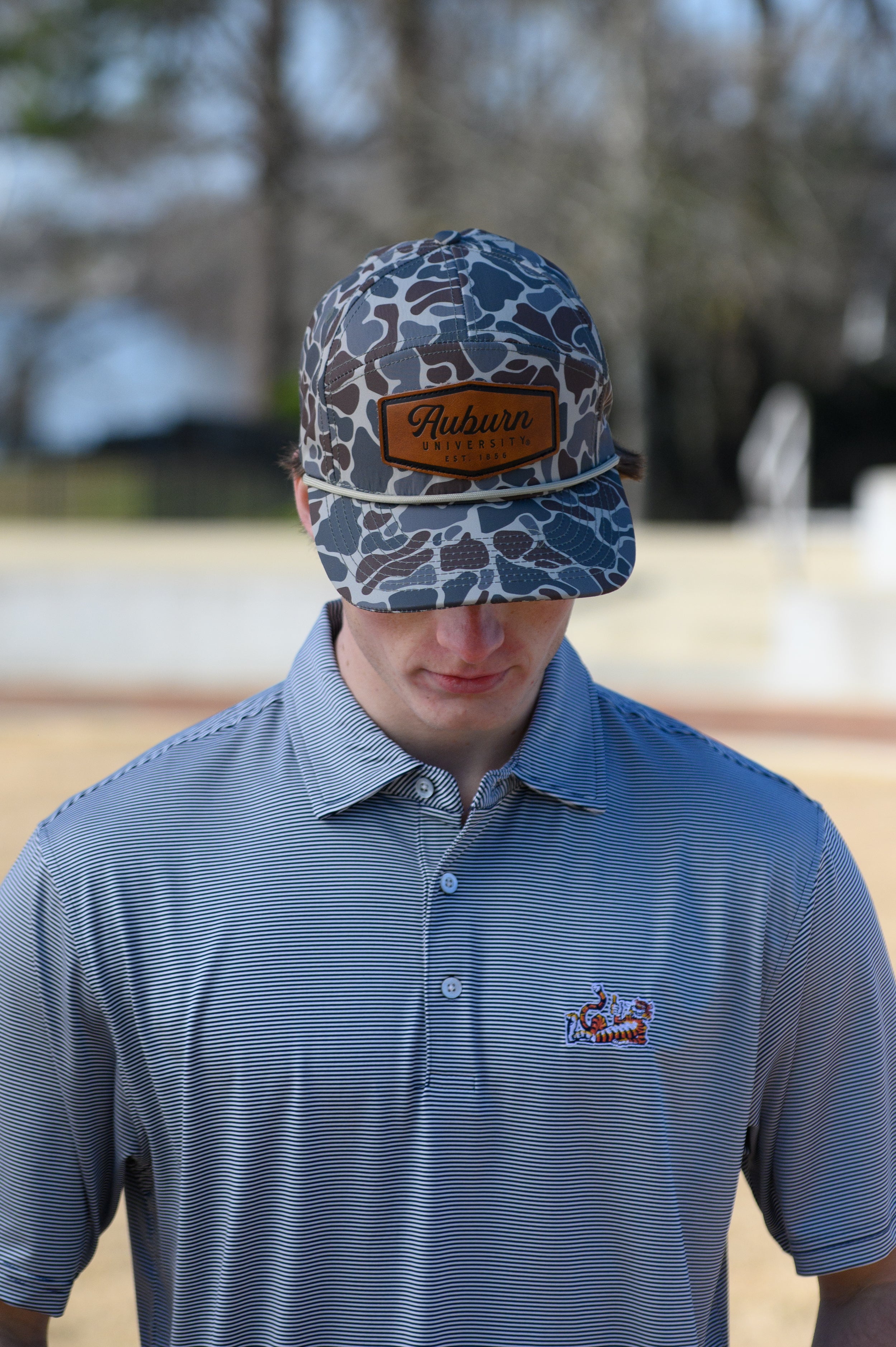 Auburn University Auburn Leather Patch Hat Duck Camo JNJ 7-Panel Hat with White rope and Leather patch with text "Auburn University"
