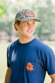 Auburn University Auburn Leather Patch Hat Duck Camo JNJ 7-Panel Hat with White rope and Leather patch with text "Auburn University"