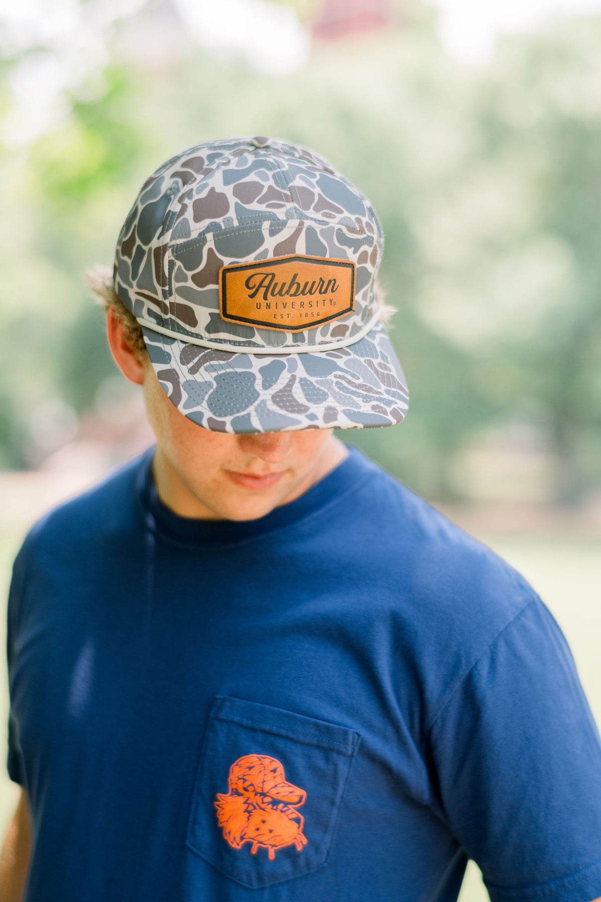 Auburn University Auburn Leather Patch Hat Duck Camo JNJ 7-Panel Hat with White rope and Leather patch with text "Auburn University"
