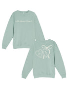 University of Alabama Seafoam Crewneck with cursive writing on the front and an open locket with the writing “Bama” inside