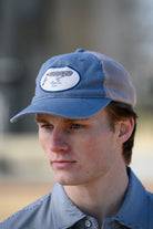 Auburn University Dusty Navy Hat featuring a patch with a tiger fishing lure with the Blue text “Auburn”