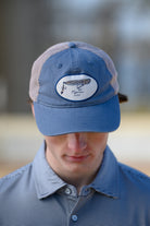 Auburn University Dusty Navy Hat featuring a patch with a tiger fishing lure with the Blue text “Auburn”