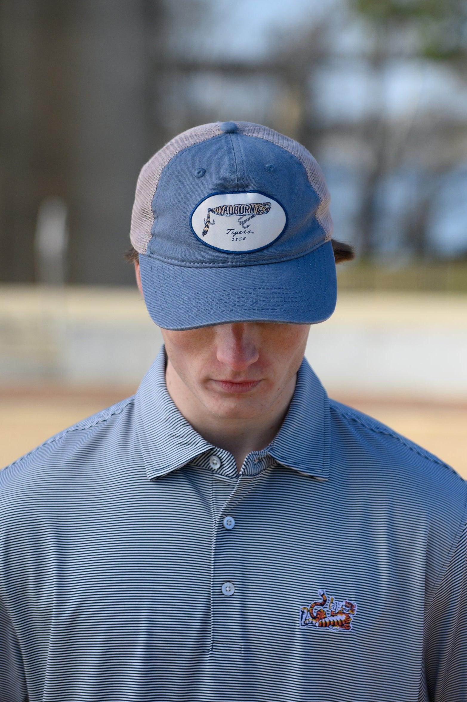 Auburn University Dusty Navy Hat featuring a patch with a tiger fishing lure with the Blue text “Auburn”