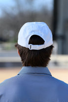 Auburn University White Hat featuring a Navy pennant flag patch with Orange script “Auburn”