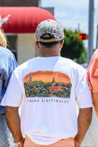 Auburn University Auburn Skyline White Comfort Colors T-Shirt with an image of a sun setting on the University above text "Auburn University"