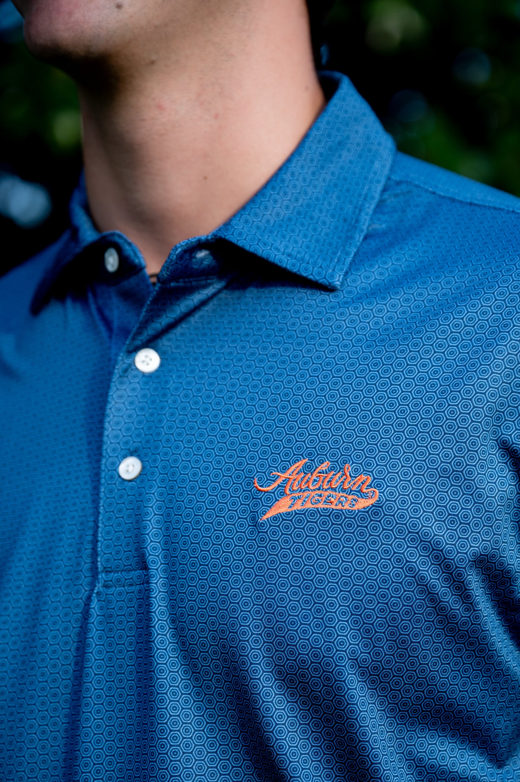 Auburn University Auburn Tigers Navy Hex Polo Men's Navy JNJ Performance polo with a subtle hex pattern and an embroidered Auburn Tigers script logo on the left chest. 