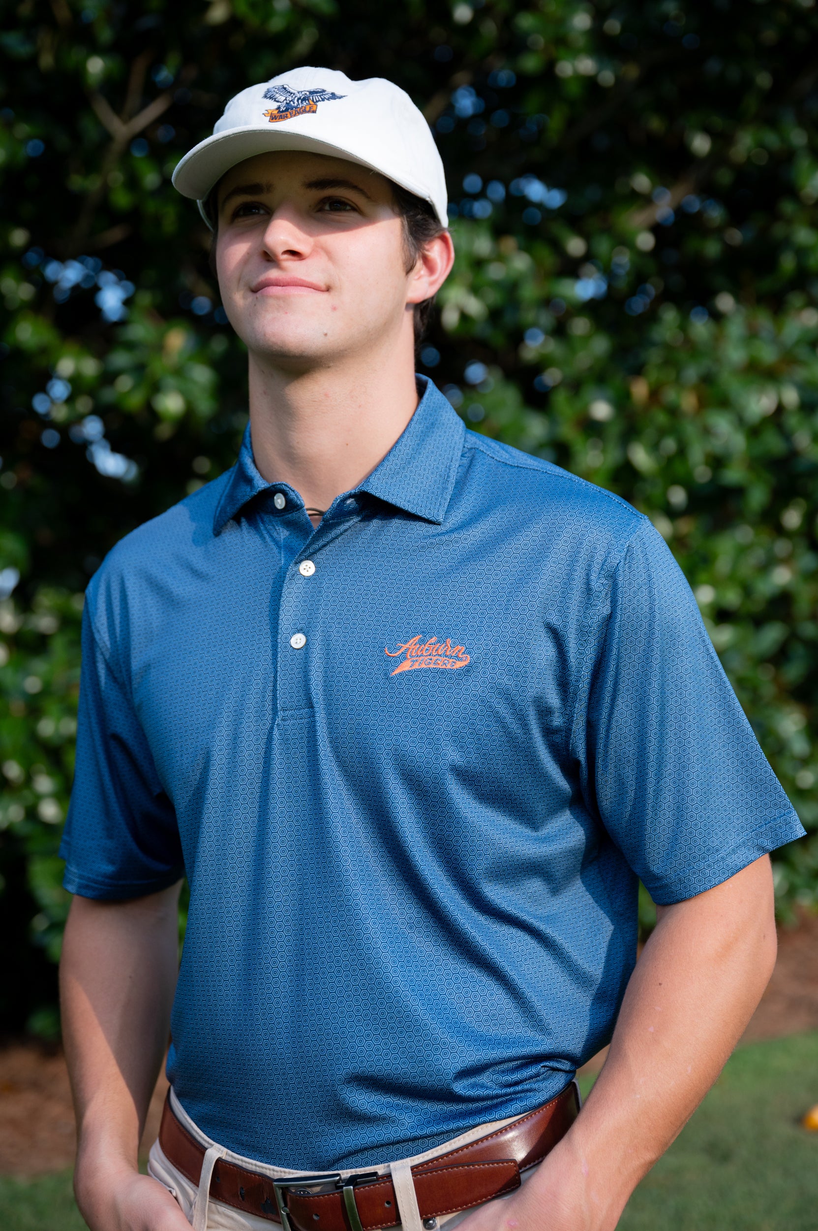 Auburn University Auburn Tigers Navy Hex Polo Men's Navy JNJ Performance polo with a subtle hex pattern and an embroidered Auburn Tigers script logo on the left chest.