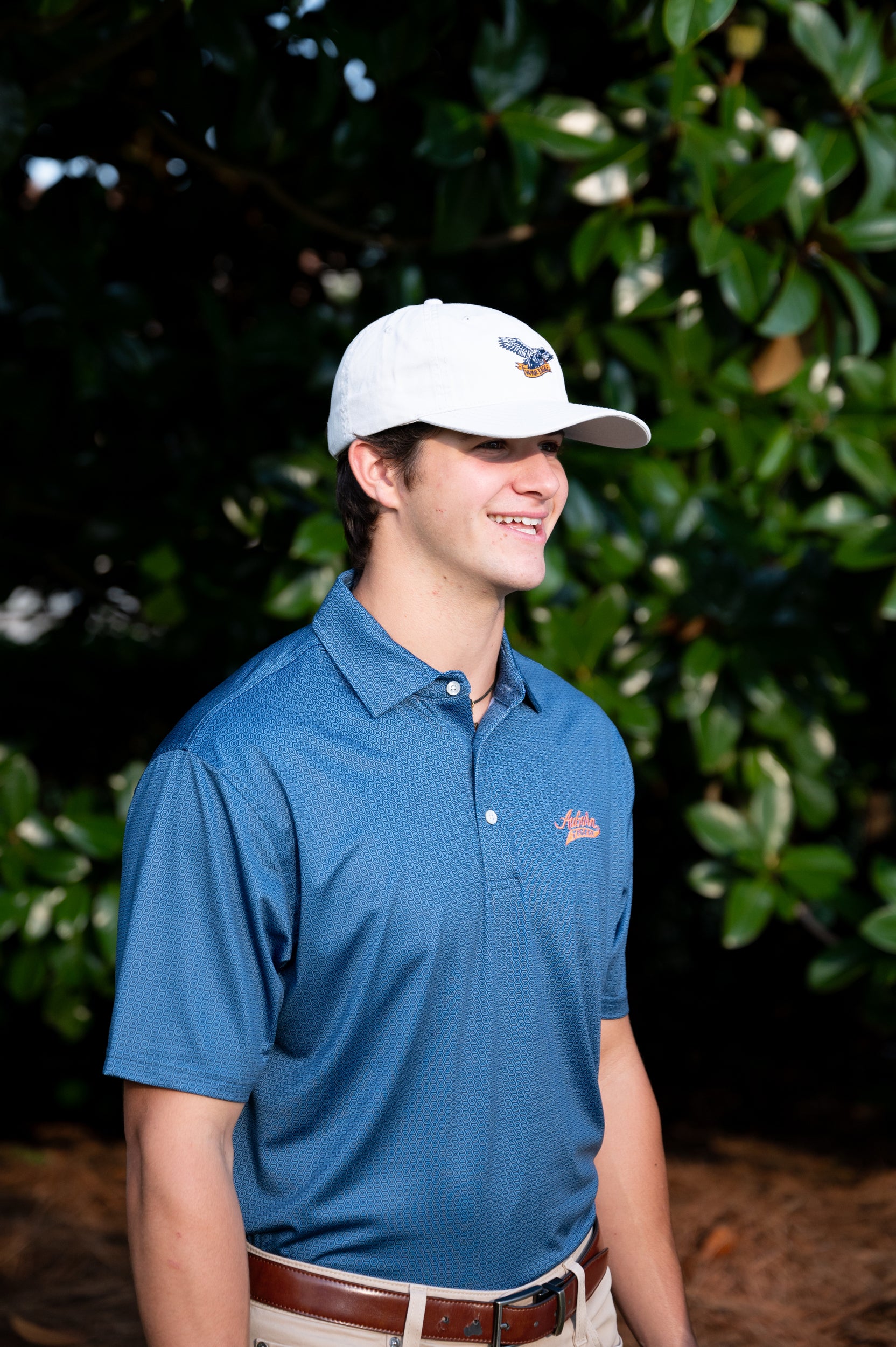 Auburn University Auburn Tigers Navy Hex Polo Men's Navy JNJ Performance polo with a subtle hex pattern and an embroidered Auburn Tigers script logo on the left chest.