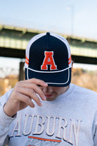 Auburn University Navy and White Trucker Hat with White piping and a fuzzy Orange Block A patch	