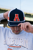 Auburn University Navy and White Trucker Hat with White piping and a fuzzy Orange Block A patch	