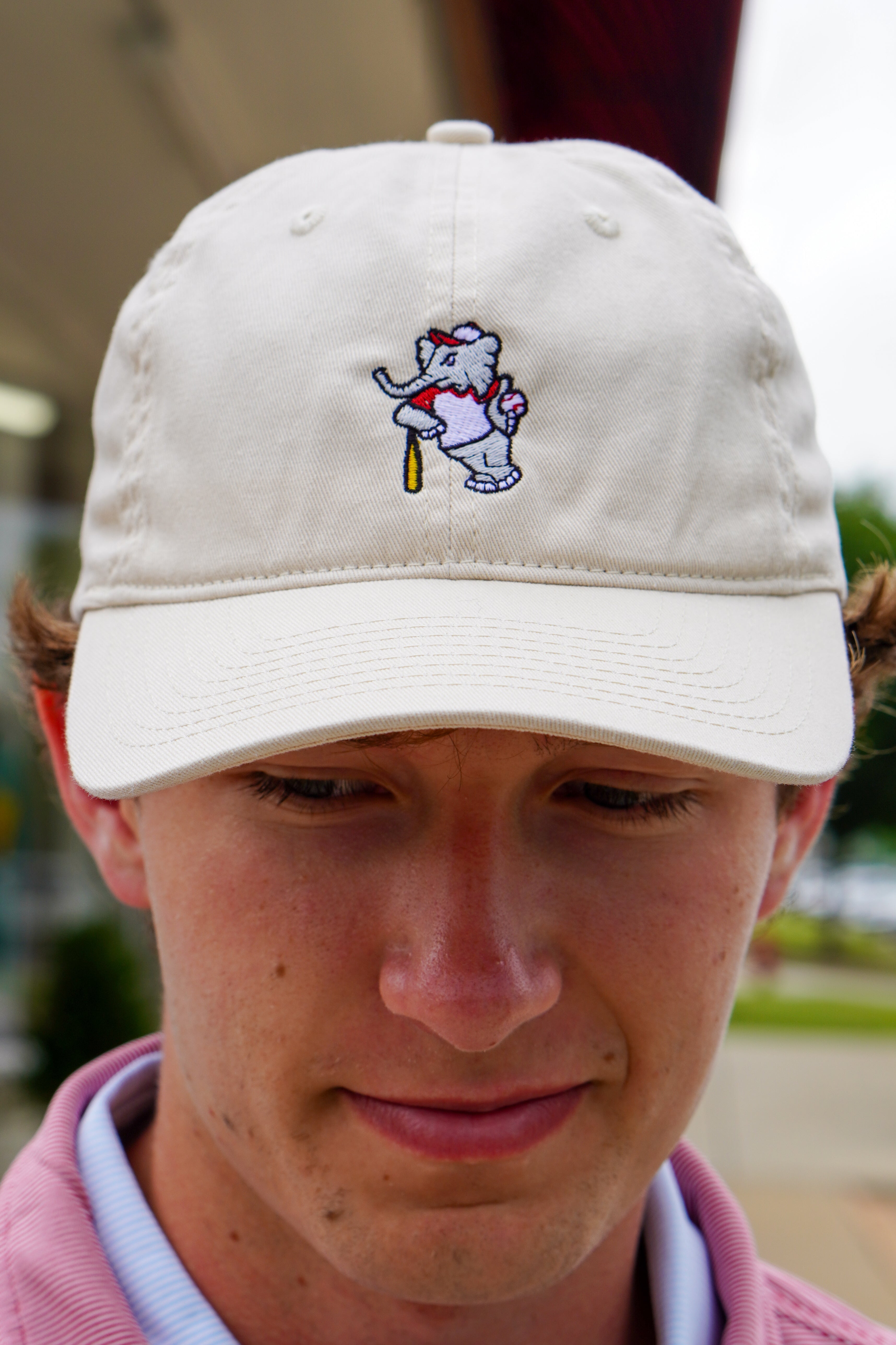 University of Alabama BallPlayer Al Khaki Men's Dad Hat with an embroidered image of Big Al in a baseball uniform leaning on a baseball bat