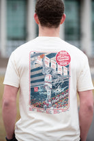 University of Alabama Ivory Shirt with an illustration of Big Al dunking a basketball next to text “Big Al” and “the Plaid Palace” above the 2025 Basketball Schedule