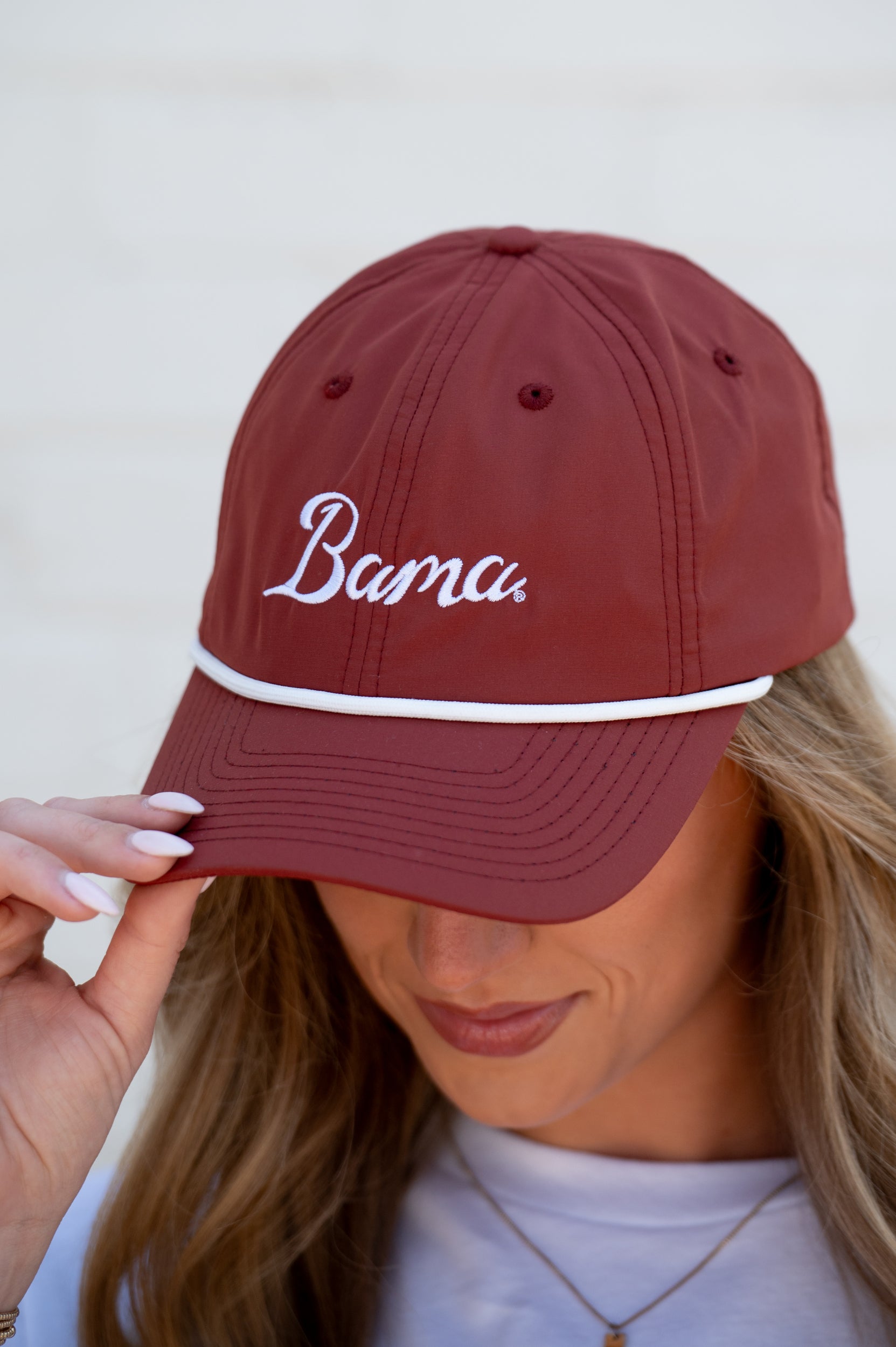 University of Alabama Dark Red Hat with a White rope and White script embroidery “Bama”