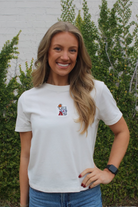 University of Alabama Off-White Ladies Short Sleeve T-Shirt with the Basketball Al Logo embroidered on the middle of the chest