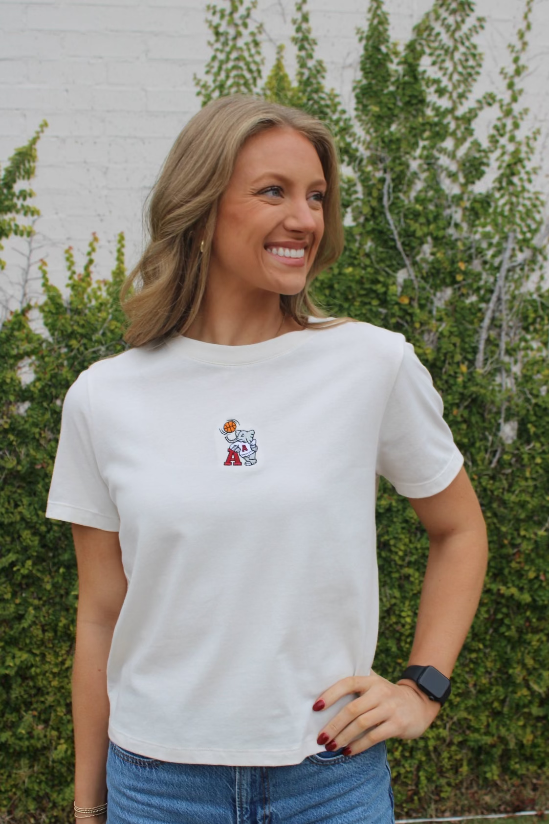 University of Alabama Off-White Ladies Short Sleeve T-Shirt with the Basketball Al Logo embroidered on the middle of the chest