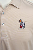 University of Alabama Basketball Al Tan Men’s Polo with an embroidered Big Al in a sweater holding a basketball and leaning against an "A"